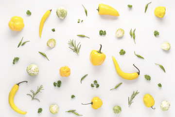 vegetables baby mix and greens, flat lay, yellow and green colors