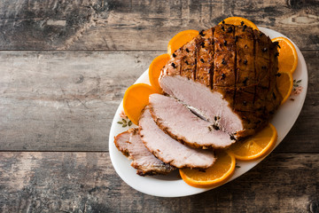 Tradicional homemade honey Glazed Ham for holidays. Copyspace

