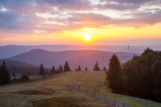 Germany, Romantic colorful sunrise on black forest mountain Kandel