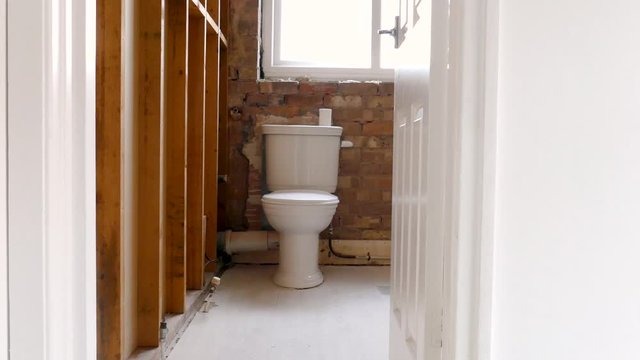 Bathroom remodelling. Home Improvement. Bare walls.