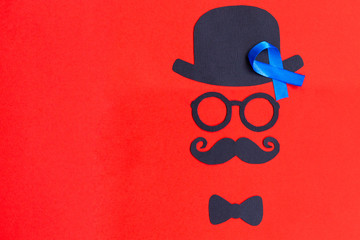 Male silhouette pattern with blue ribbon symbol. November concept.