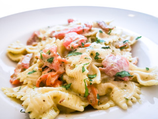 tasty pasta with salmon on a the table