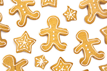 Background of Gingerbread People and Stars on a White Surface