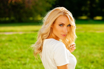 Fototapeta na wymiar Portrait close up of young beautiful blonde woman