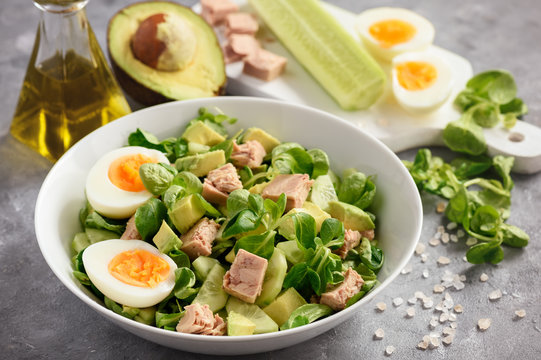 Healthy tuna salad with avocado and eggs.