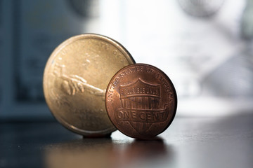 1 Dollar (USD) cent coin, currency of United States (USA). One cent and one dollar
