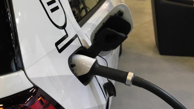 Modern electric vehicle charging station. 4K, UHD, 50p, Cinematic,Closeup, 