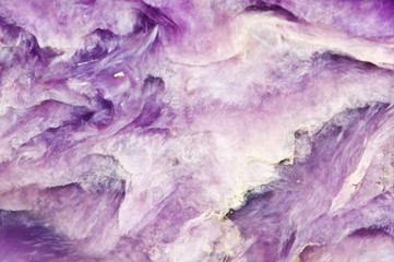 Obraz na płótnie Canvas Lilac background. Charoite. Mineral. Crystal. Natural abstract b
