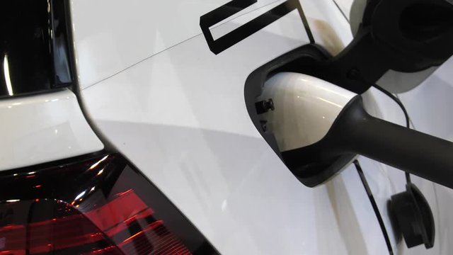 Modern electric vehicle charging station. 4K, UHD, 50p, Cinematic,Closeup, 