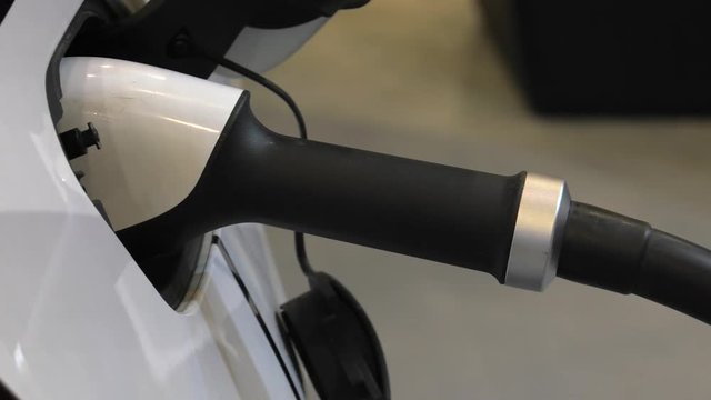 Modern electric vehicle charging station. 4K, UHD, 50p, Cinematic,Closeup, 