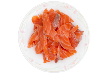 sliced raw salmon in dish isolated on white background, clipping paths