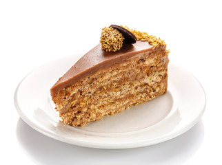 A piece of caramel cake, isolated on a white background