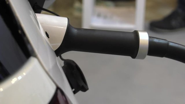 Modern electric vehicle charging station. 4K, UHD, 50p, Cinematic,Closeup, 