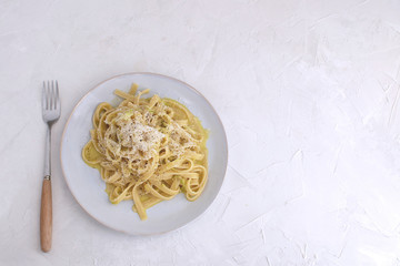 Healthy food low fat Vegetarian carbonara with zucchini Slow carb dinner top view White background Copy space Horizontal