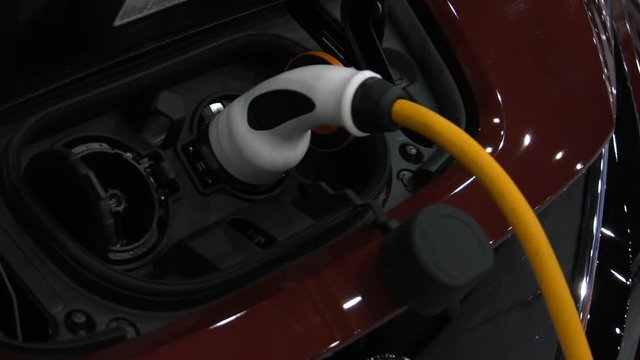 Modern electric vehicle charging station. 4K, UHD, 50p, Cinematic,Closeup, 