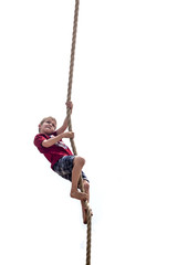 Boy Climbing a Rope
