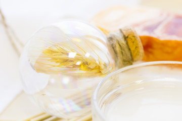 Spa and wellness setting with oil and wheat