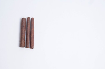 Cuban cigars on white background