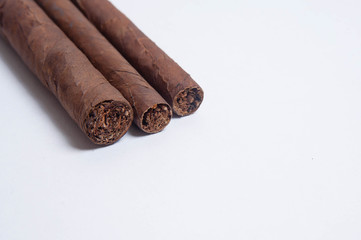 Cuban cigars on white background