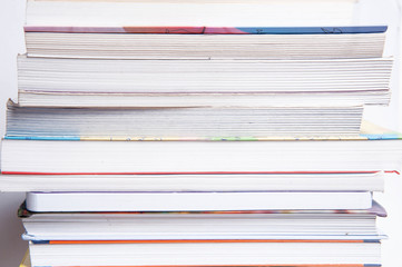 High books stack isolated on white background