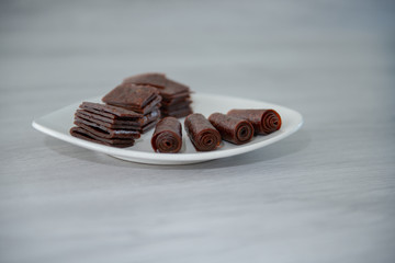 Chewing candy from sweet dough on fruit juice.