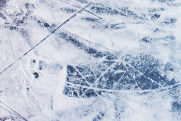 Texture of white ice surface with snow