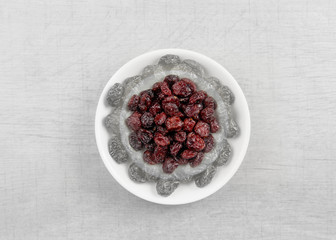 Pile of dried cranberries isolated on white background. 