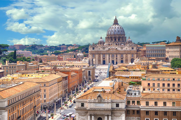 Fototapeta na wymiar ROME, ITALY - JULY 01, 2014 - Beautiful view of Vatican and Basilica of St. Peter from roof of saint Angel castle.