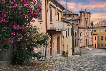 Longiano, Forli-Cesena, Emilia-Romagna, Italy: cityscape with oleander flowers and the ancient...