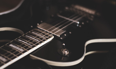 Fototapeta na wymiar Electric guitar close-up, guitar for background