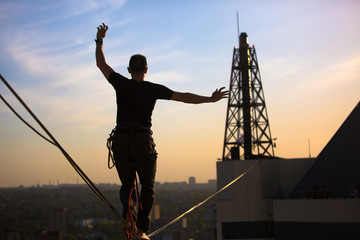 Slackliner balancing on highline