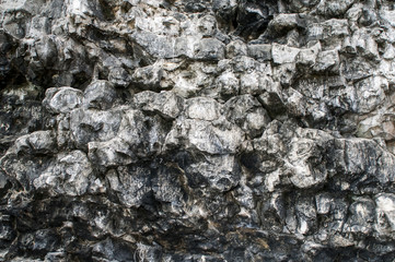 The texture of natural gray stone. Forms formed by nature.