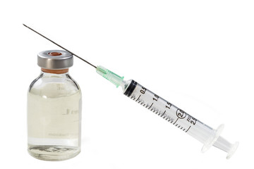 Medical vials for injection with a syringe on white background