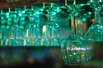 beautiful crystal glasses hanging in the bar