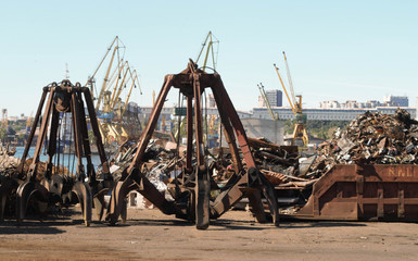 Old iron on cheu in port with sky blue sky and cranes