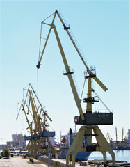 Cranes on the quay in the harbor