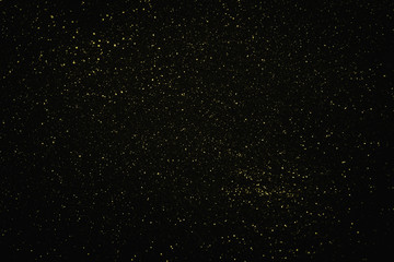 Black background for christmas navy glitter sparkle. Abstract bokeh light shiny dark holiday.