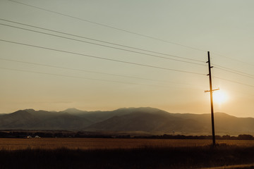 Power Lines in Front of Beautiful Mountain Scenery