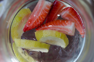 Strawberries and Lemons in ice water
