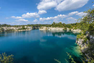 Obraz premium Beautiful quarry with blue water. Water reservoir Zakrzowek in Krakow, Poland