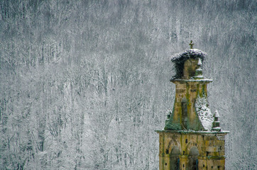 Snow-covered view of the bulrush of the church of Herreruela de castilleria, in Palencia. Spain