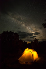 Glowing Tent Under Milky Way