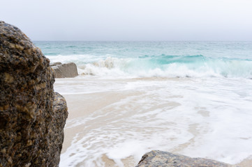 Sea view with rocks and sand
