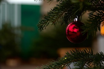 Decorated Christmas tree on blurred