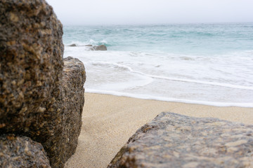 Sea view with rocks and sand
