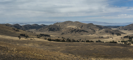 Along the road from San Pedro de Tiquina to Copacabana on the Titicaca lake, the largest highaltitude lake in the world (3808m) – Bolivia, South America 