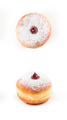 Closeup detail of tasty donut with powder and jam, isolated on white background. Top and side view