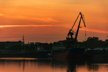 tanker at docks at sunset