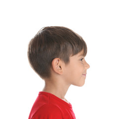 Cute little boy on white background. Hearing problem