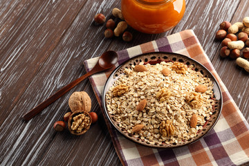 Oat flakes with honey and nuts.